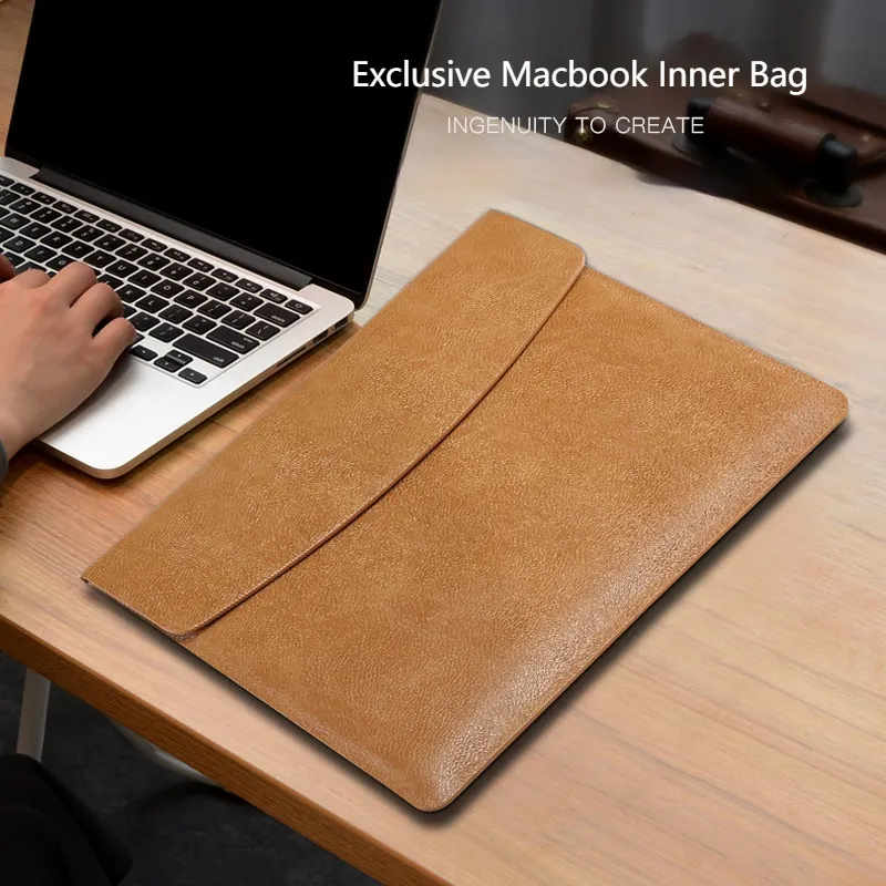 Brown leather laptop sleeve for 11-15.4 inch MacBook.